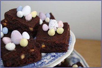 Chocolate brownies decorated with mini eggs