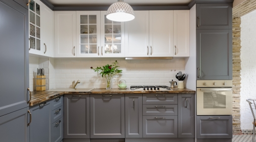 interior of modern luxury grey and white wooden kitchen