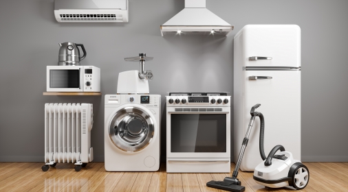 Set of home kitchen appliances in the room on the wall background.