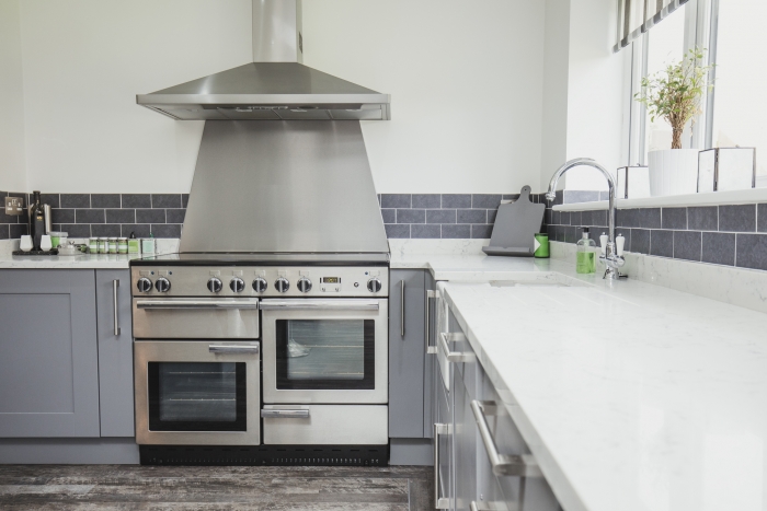 Room shot of a contemporary domestic kitchen.