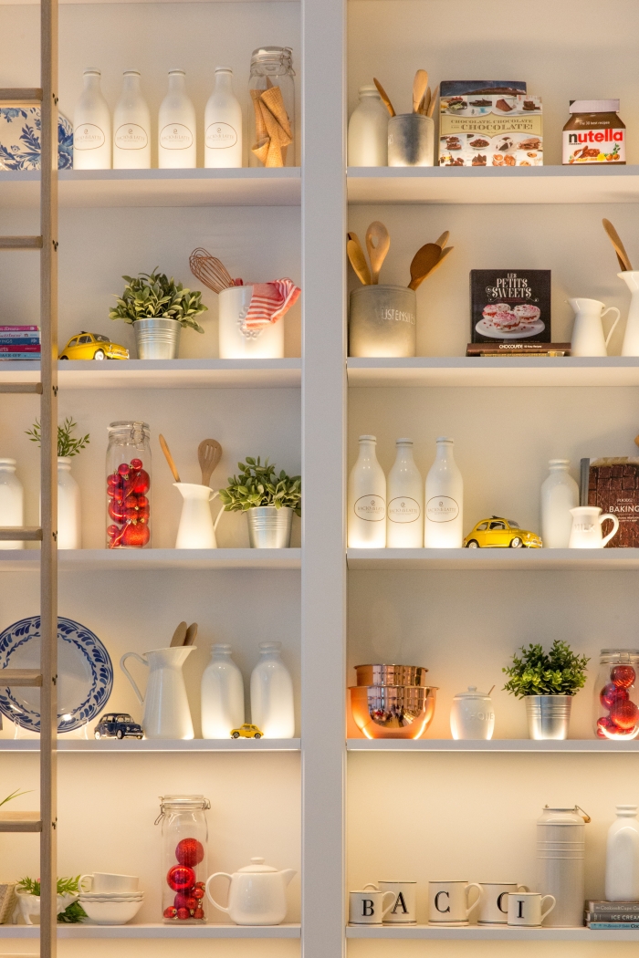 kitchen cupboard organised with utensils