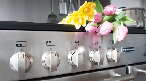 oven with flowers on top of it