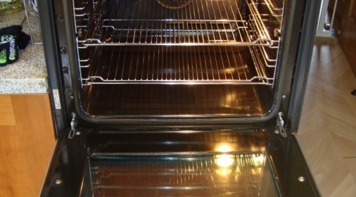 A clean oven with door open