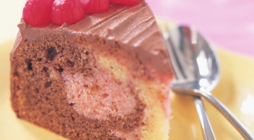 raspberry marble cake with raspberries on the top