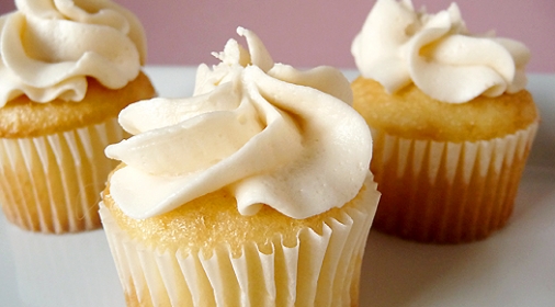 Vanilla cupcakes with frosting on the top