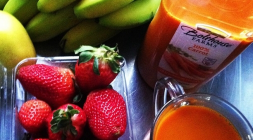 strawberries and bananas and a vegetable juice